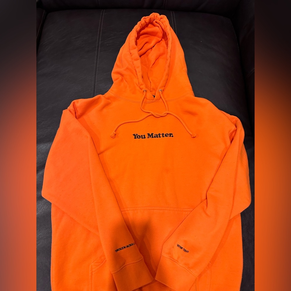Black and Orange You Matter hoodie by Demetrius Harmon